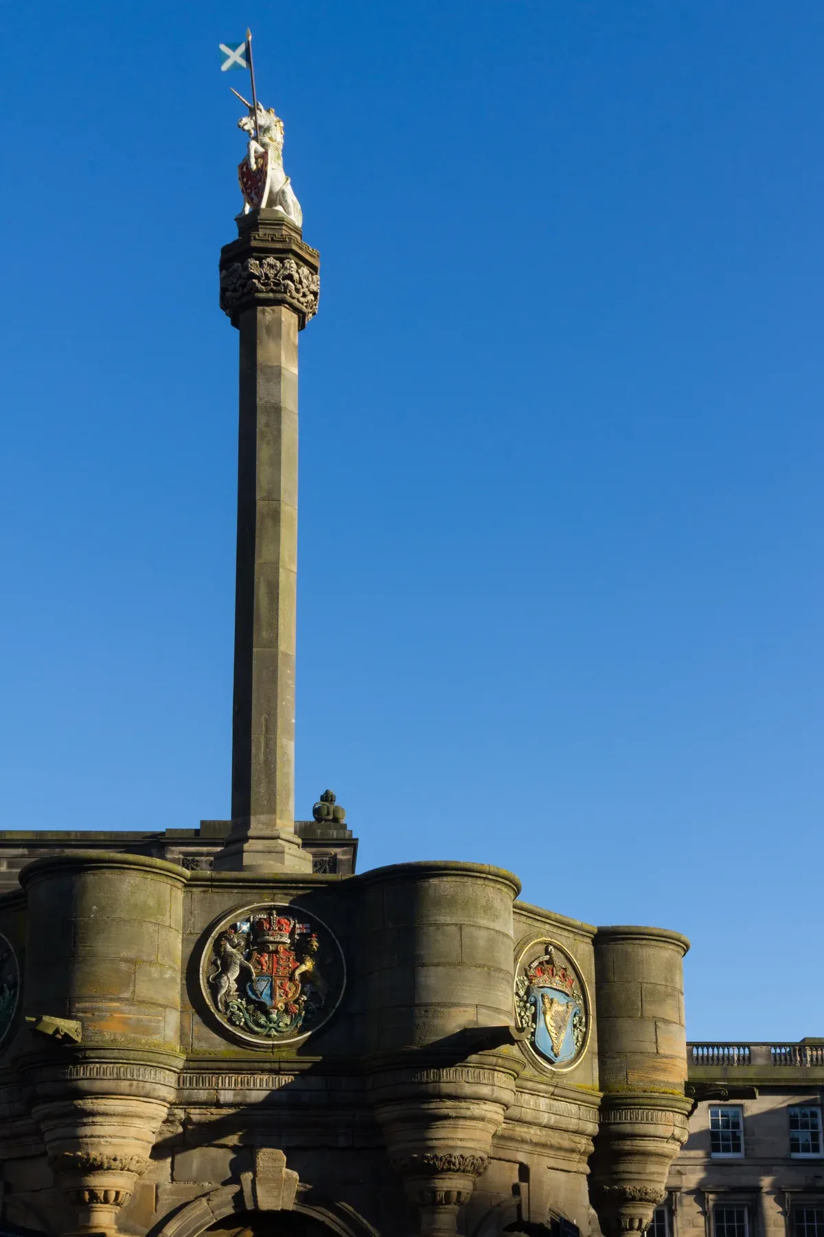 The Mercat Cross on the Royal Mile topped with a unicorn, a common meeting point for Edinburgh ghost tours, Edinburgh ghost tours, Edinburgh, Scotland